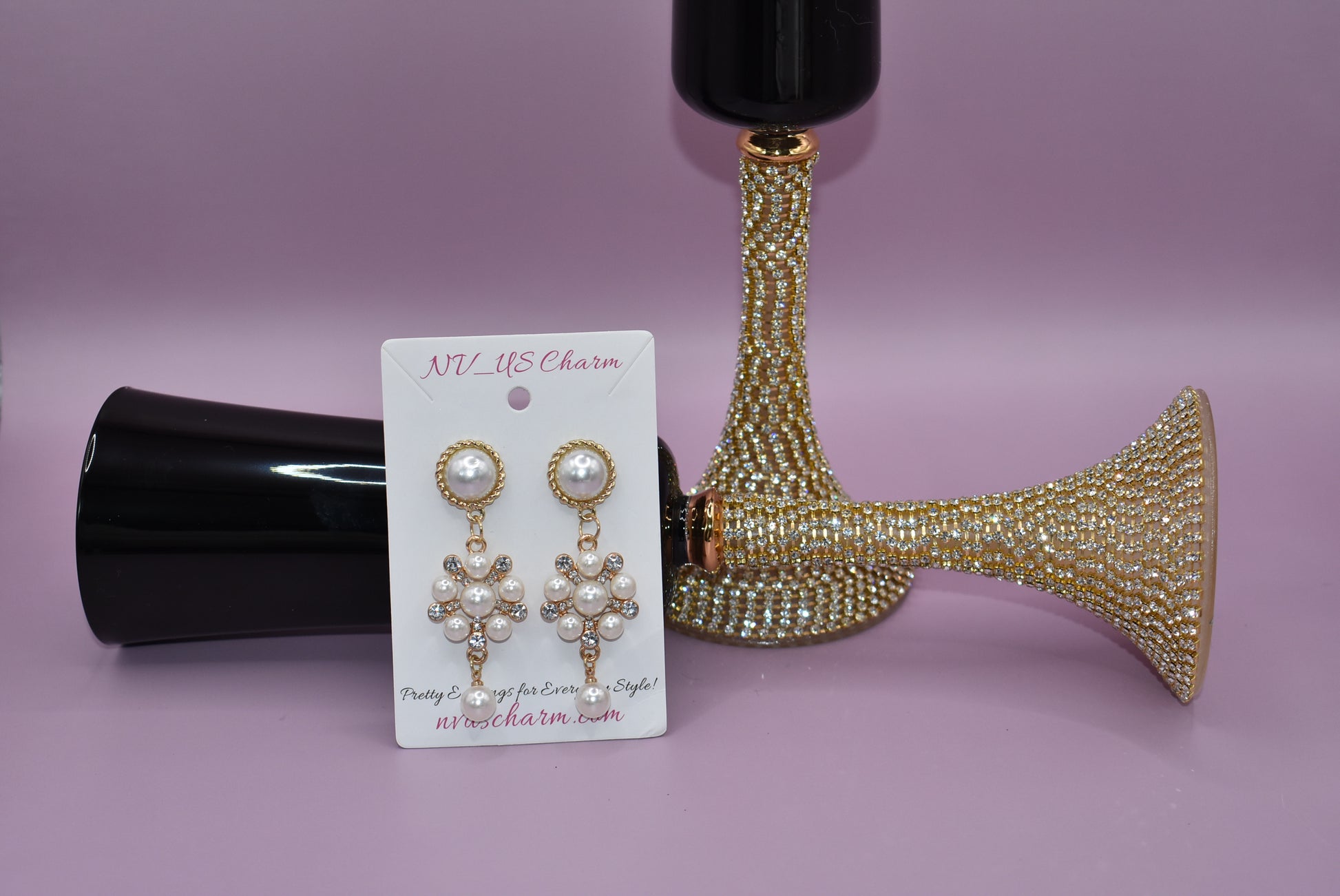 This stunning Wedding Collection features a picture perfect design perfect for any bride. Each beautiful pearl post holds an elegant pearl cluster with gem stones and is finished off with a hanging pearl at the bottom, making the perfect statement for a special day.