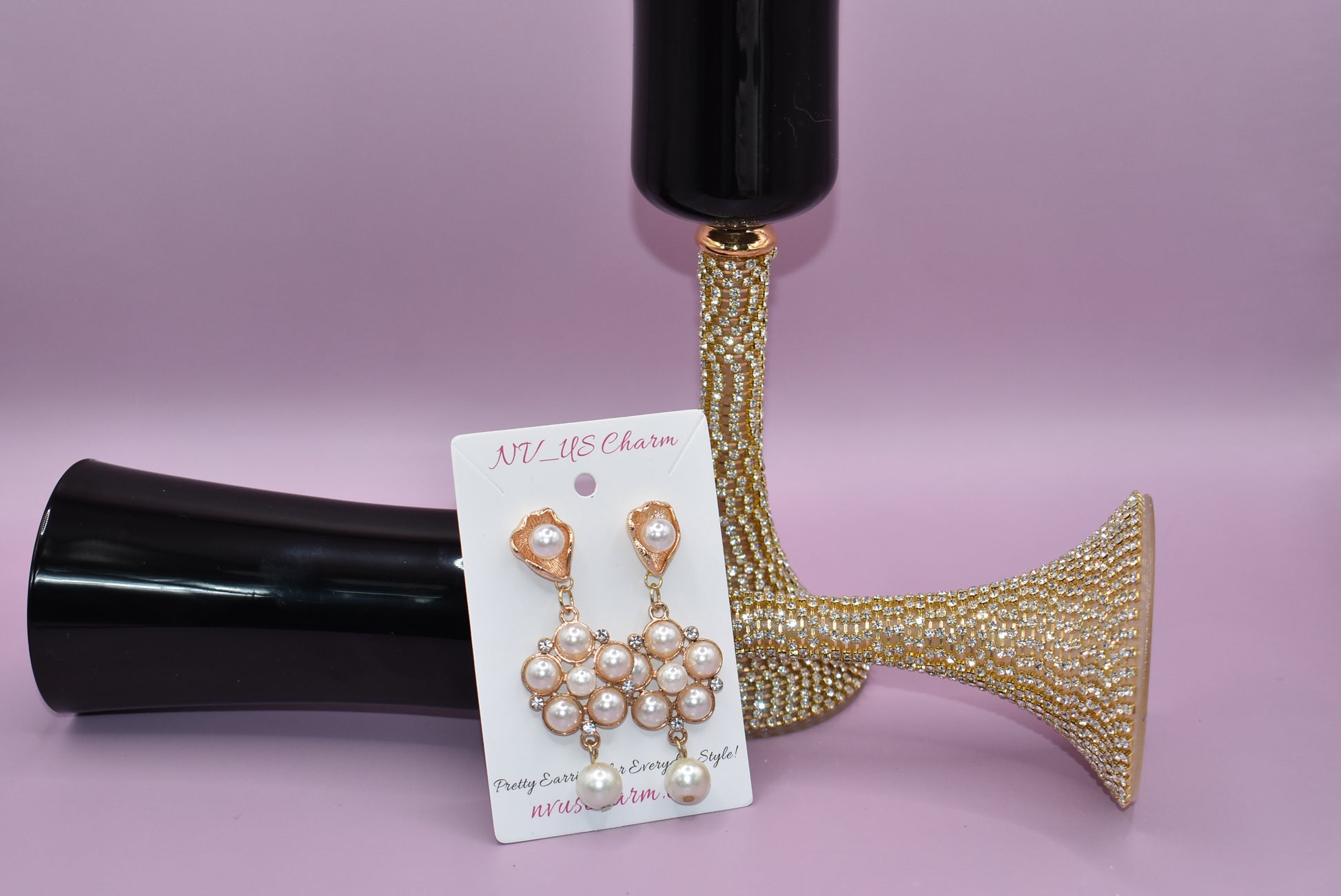 This luxurious Wedding Collection 13 features prestigious posts crafted from pearl and gold that hold a stunning cluster of pearls and crystals. A single suspended pearl adds an elegant finishing touch. Perfect for special occasions or any time you want to make a statement.