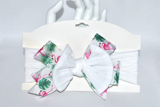 Get ready to flaunt your flamingo flair with this adorable wide white headband! 🎀 Featuring the cutest flamingo ribbon, it’s a one-of-a-kind accessory that adds fun to any outfit. Soft and comfy for all ages, it’s perfect for flamingo fans who love style and comfort! 🦩✨