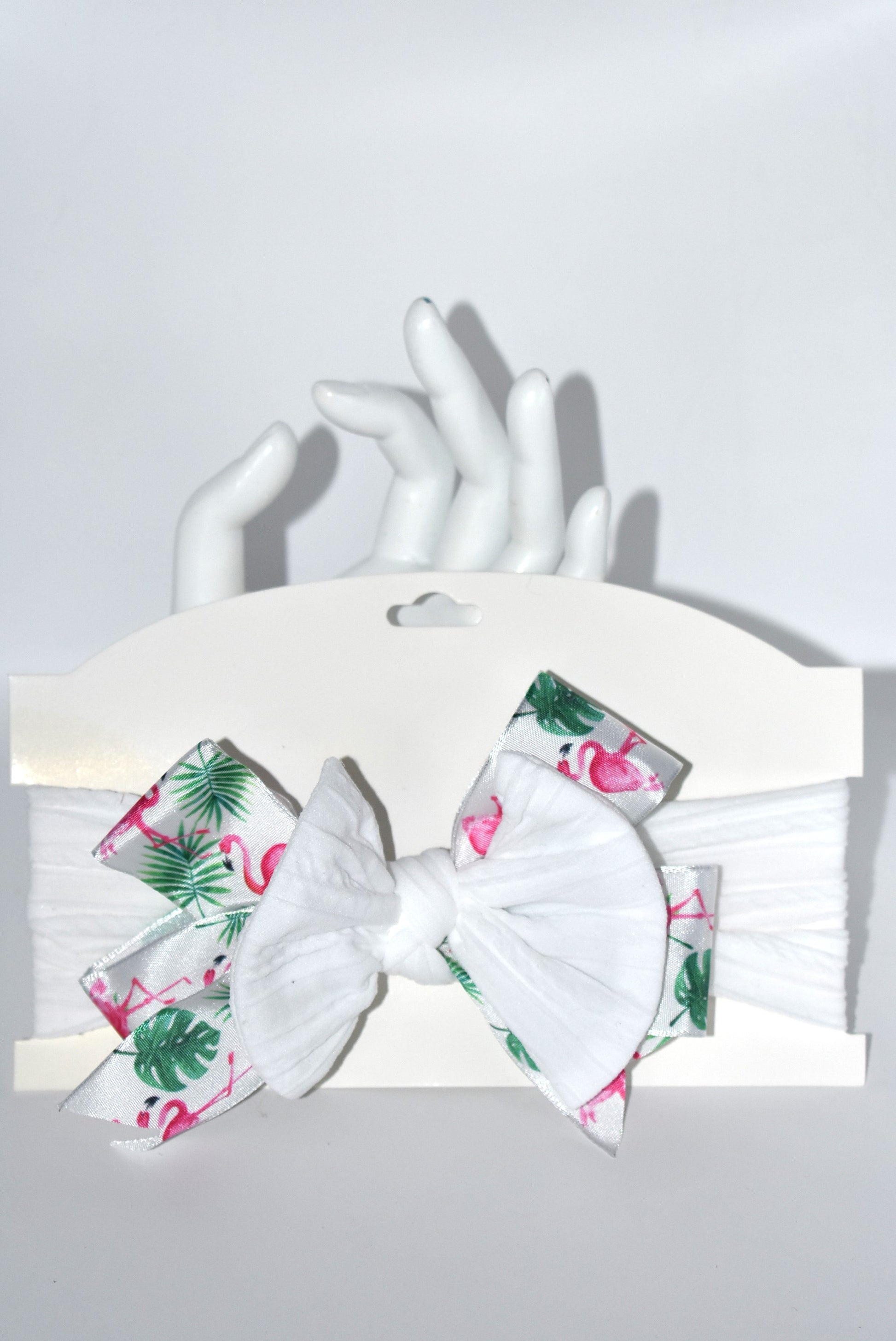 Get ready to flaunt your flamingo flair with this adorable wide white headband! 🎀 Featuring the cutest flamingo ribbon, it’s a one-of-a-kind accessory that adds fun to any outfit. Soft and comfy for all ages, it’s perfect for flamingo fans who love style and comfort! 🦩✨