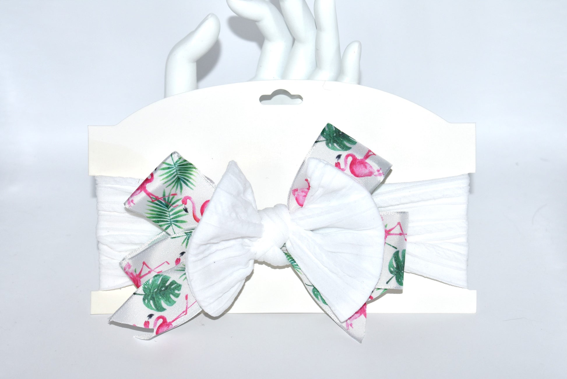 Get ready to flaunt your flamingo flair with this adorable wide white headband! 🎀 Featuring the cutest flamingo ribbon, it’s a one-of-a-kind accessory that adds fun to any outfit. Soft and comfy for all ages, it’s perfect for flamingo fans who love style and comfort! 🦩✨