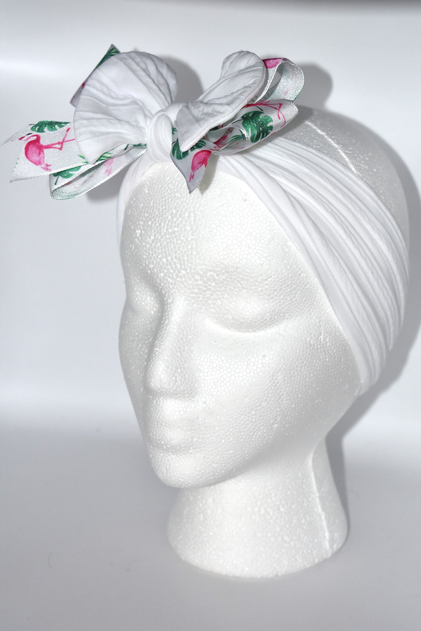 Get ready to flaunt your flamingo flair with this adorable wide white headband! 🎀 Featuring the cutest flamingo ribbon, it’s a one-of-a-kind accessory that adds fun to any outfit. Soft and comfy for all ages, it’s perfect for flamingo fans who love style and comfort! 🦩✨