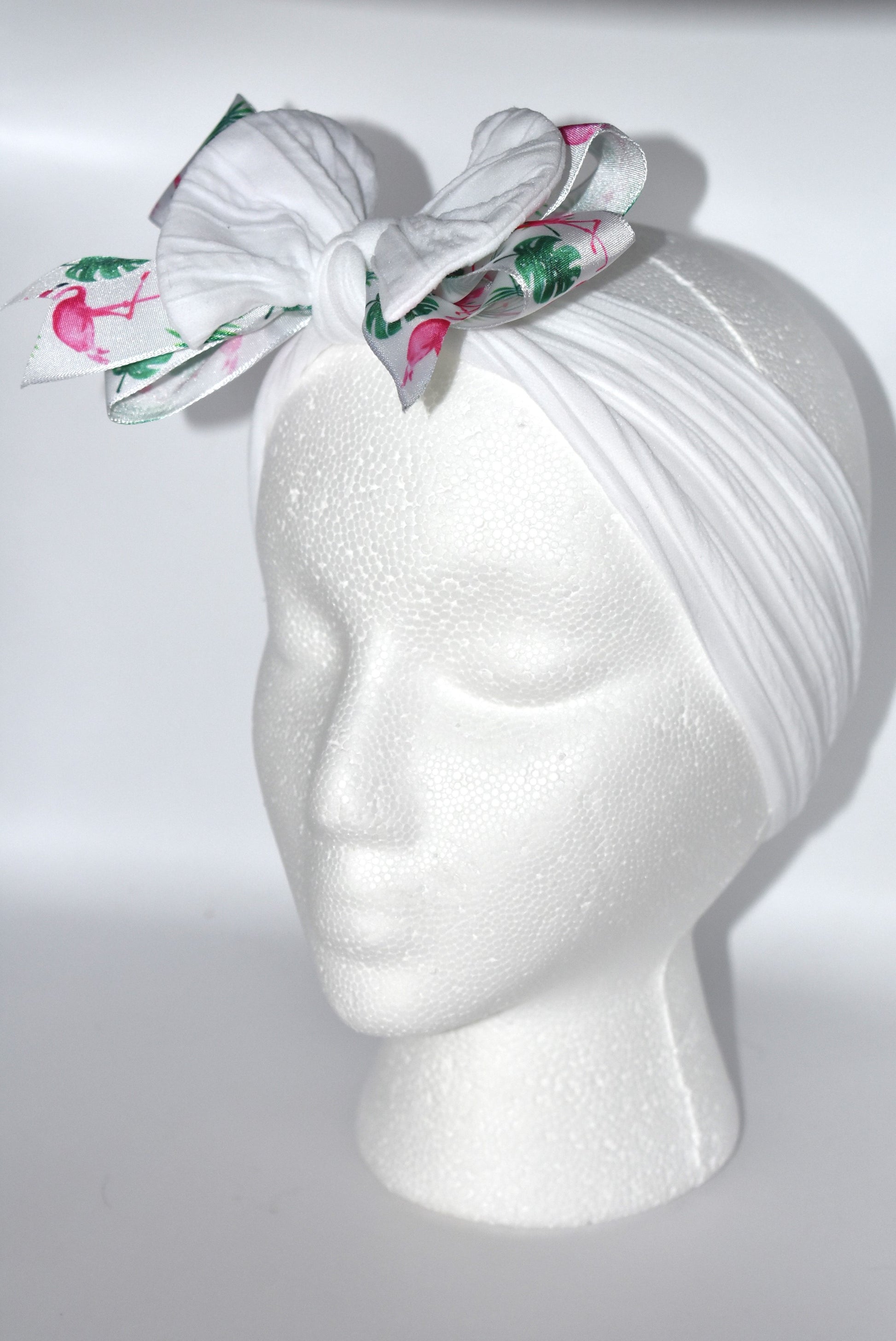 Get ready to flaunt your flamingo flair with this adorable wide white headband! 🎀 Featuring the cutest flamingo ribbon, it’s a one-of-a-kind accessory that adds fun to any outfit. Soft and comfy for all ages, it’s perfect for flamingo fans who love style and comfort! 🦩✨
