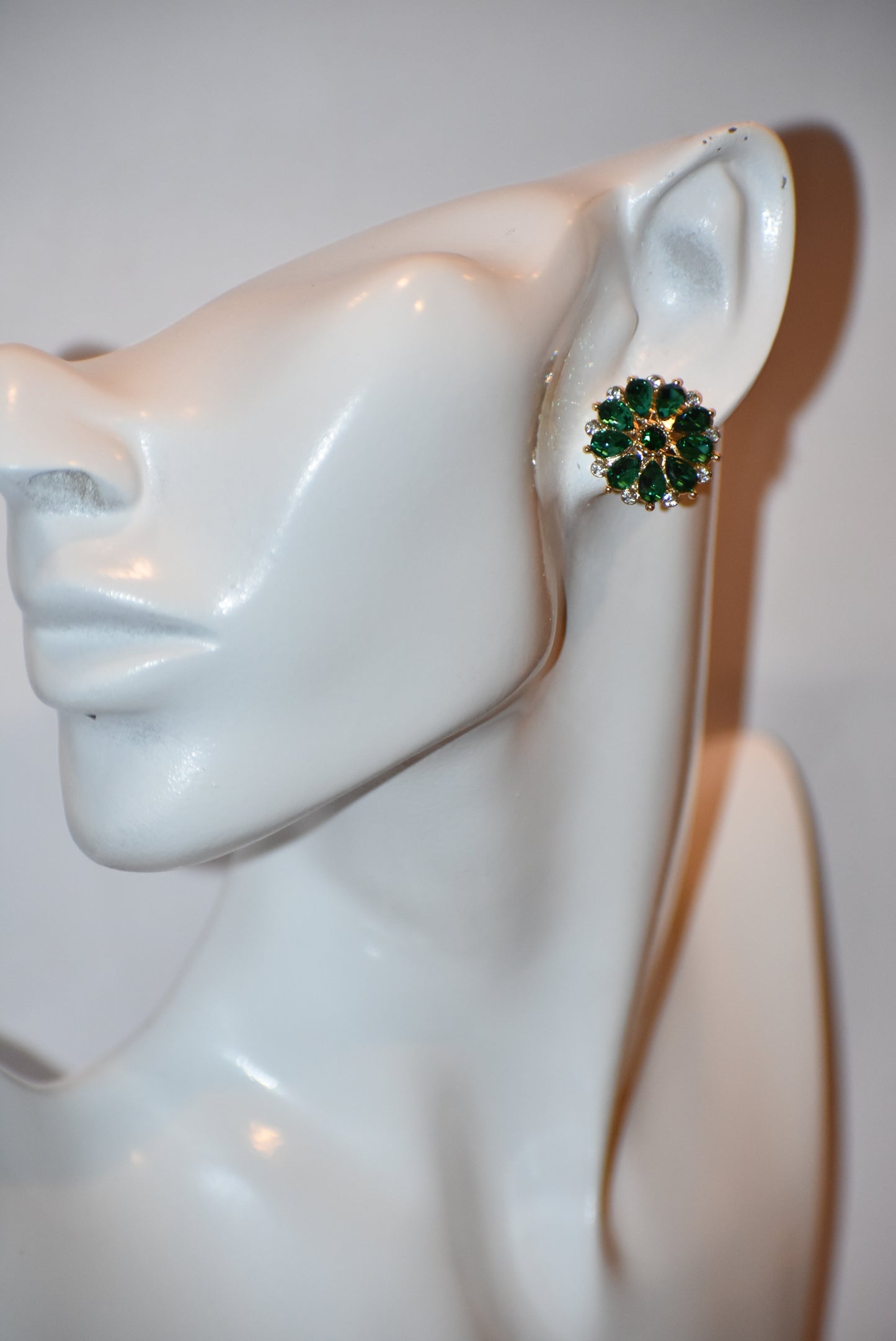 Unleash your unique style with our Green Collection earrings! These eye-catching post earrings feature hypoallergenic posts and stunning emerald green and white crystals. With a vintage-inspired design, you're sure to turn heads and make a statement. Perfect for any special occasion outfit!