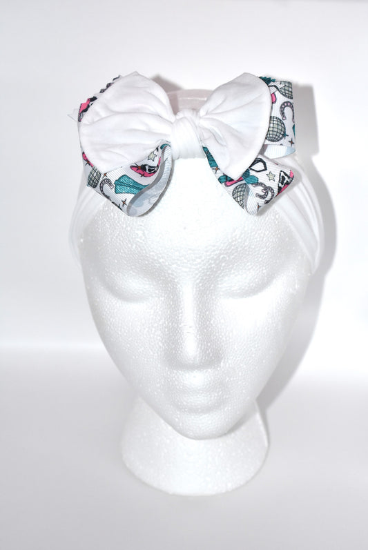 Get ready to ride in style with this pretty white wide headband! Featuring a soft fabric and a charming cowgirl bow in the center, it’s comfortable and perfect for cowgirls of all ages. Add a fun and unique touch to any outfit—giddy up! 🤠🎀💖