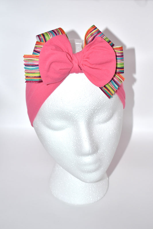 Add a splash of fun to your style with this pretty pink, soft, and wide headband 🌸! Featuring a lively multi-colored motif, it's perfect for any outfit and every age 🎨✨. Don’t miss out—grab this one-of-a-kind wrapped headband before it’s gone! 💖🎀