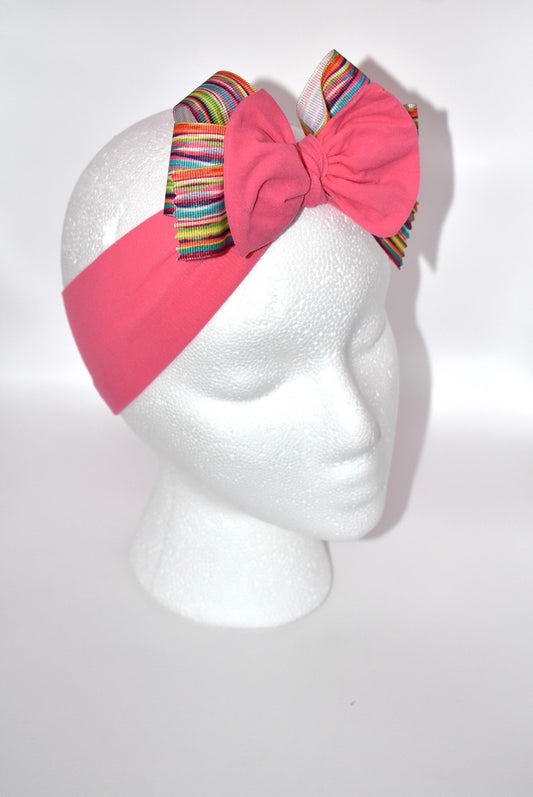 Add a splash of fun to your style with this pretty pink, soft, and wide headband 🌸! Featuring a lively multi-colored motif, it's perfect for any outfit and every age 🎨✨. Don’t miss out—grab this one-of-a-kind wrapped headband before it’s gone! 💖🎀