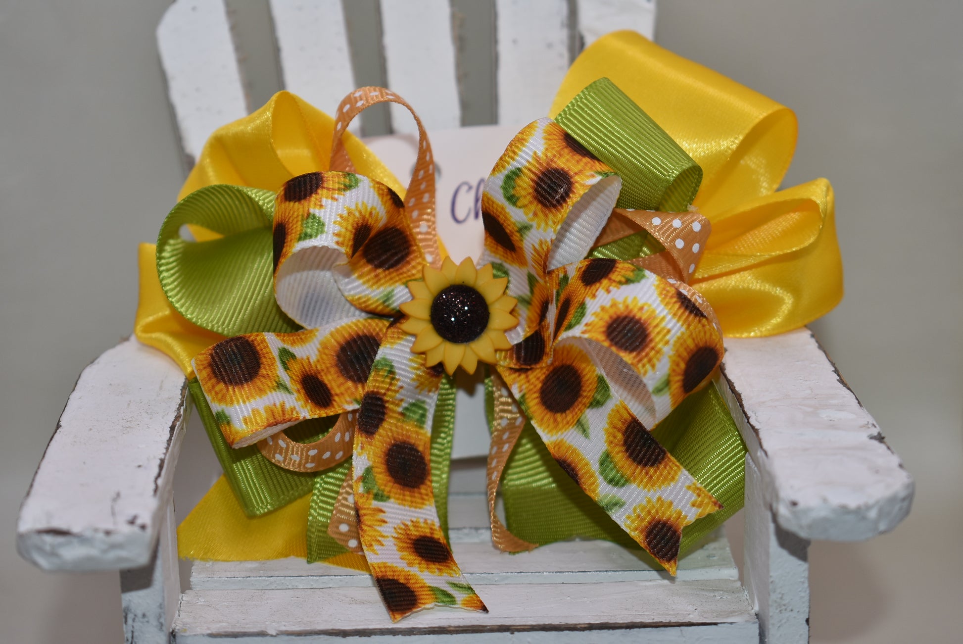 Add a burst of sunshine to your look with this super cute layered ribbon clip! Featuring a charming sunflower motif topped with a delightful sunflower charm, it’s perfect for brightening any outfit. The wrapped alligator clip ensures a secure hold while keeping your style fresh and fun. 🌻✨ Perfect for those who love a playful touch!