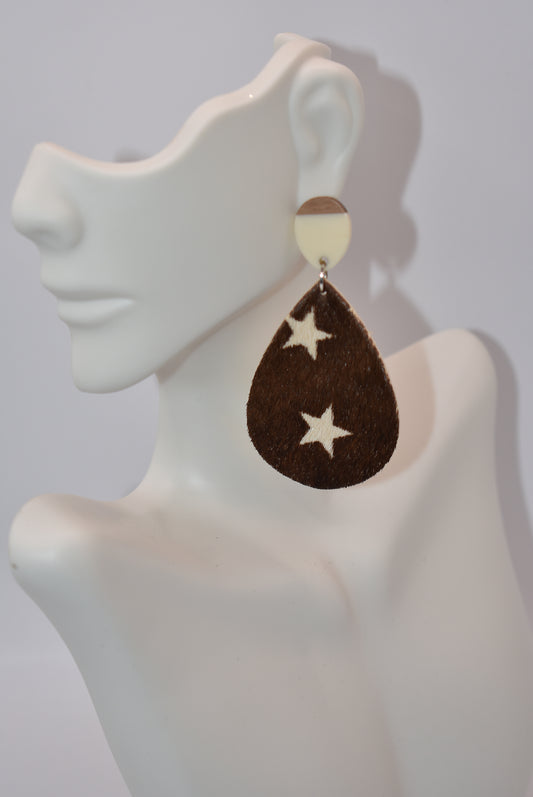 Get your western look on and show off your pride with our Western Collection! Made from soft cowhide material, these earrings feature two stars on each piece and have comfortable lightweight designs. Plus, the cream and wood hypoallergenic posts ensure comfort for all-day wear. Yee-haw!