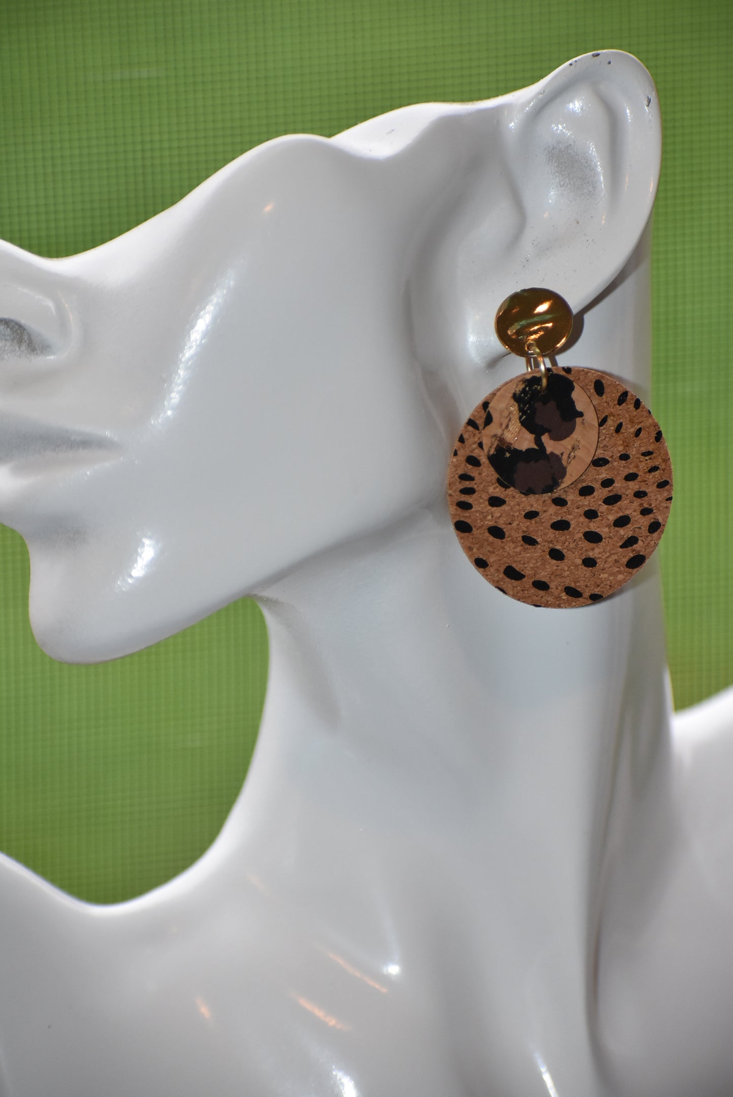 Walk on the wild side with these unique round cork leopard print earrings! Comfortably lightweight and crafted with a gold plated, hypoallergenic post, these are sure to make a statement without weighing you down! Ready for a roarin' good time? Jazz up any look with these wild accessories!