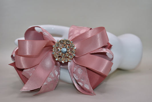 ✨ Elevate your hair game with this stunning satin ribbon clip! Luxuriously soft layers of beautiful satin create an elegant foundation, while a sparkling crystal charm sits pretty on top for that extra touch of glamour. 💎 The wrapped alligator clip ensures a secure, comfortable hold that lasts all day long. Perfect for adding a dash of sophistication to any look! 🎀
