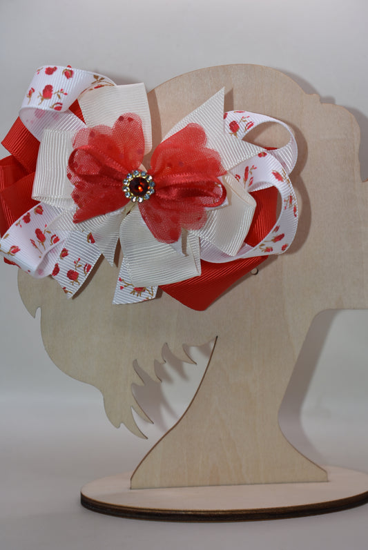 ✨ Nana's Collection brings timeless charm with this adorable red and white bow that's bursting with personality! 🎀 Layers upon layers of luxurious ribbon in classic red and white create beautiful dimension and texture, while a stunning red crystal perched on top adds that perfect sparkle. 💎 Whether you're dressing up a gift, accessorizing your look, or adding a pop of festive flair to any occasion, this sweet bow is sure to turn heads. 🌹 Pure elegance meets playful style!