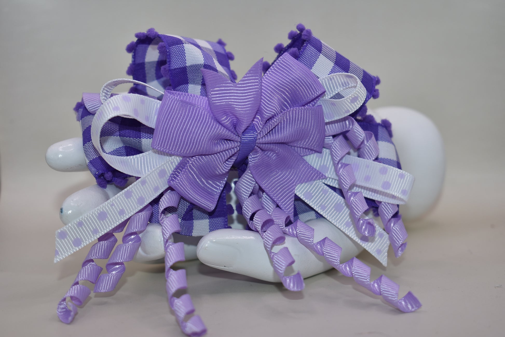 ✨ Add a pop of purple pizzazz to any hairstyle with this adorable layered bow! 🎀 Featuring streaming ribbons that twirl and dance with every movement, it's as fun to wear as it is to look at. The wrapped alligator clip keeps everything secure and comfy all day long, so your little one can play, twirl, and have a blast without a care. 💜 Perfect for everyday cuteness or special occasions! 🌈