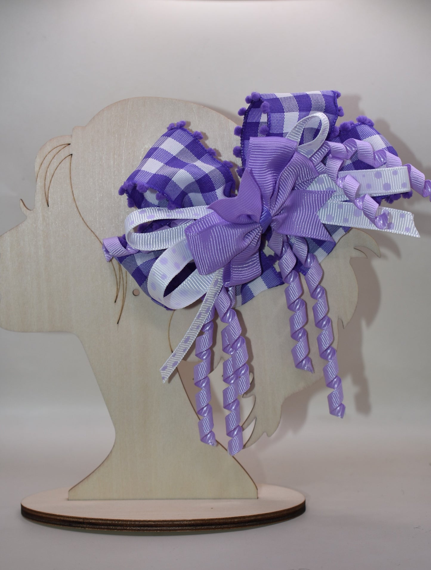 ✨ Add a pop of purple pizzazz to any hairstyle with this adorable layered bow! 🎀 Featuring streaming ribbons that twirl and dance with every movement, it's as fun to wear as it is to look at. The wrapped alligator clip keeps everything secure and comfy all day long, so your little one can play, twirl, and have a blast without a care. 💜 Perfect for everyday cuteness or special occasions! 🌈