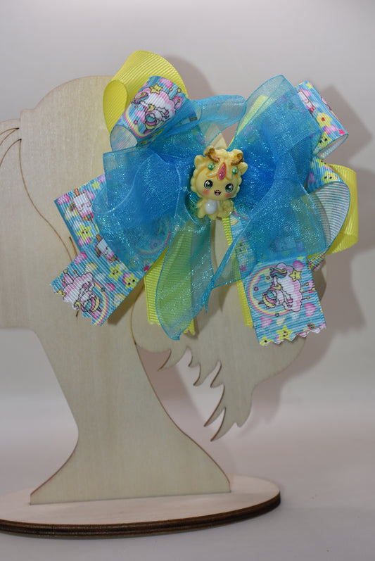 ✨ Get ready to add some magical flair to your hair! This one-of-a-kind unicorn bow features layers upon layers of gorgeous ribbon, beautifully accented with enchanting unicorn-themed ribbon and the sweetest little unicorn charms perched right on top. 🦄 The wrapped alligator clip makes it super easy to secure and wear all day long. Perfect for unicorn lovers who want to sprinkle a little extra sparkle into their style! 💫