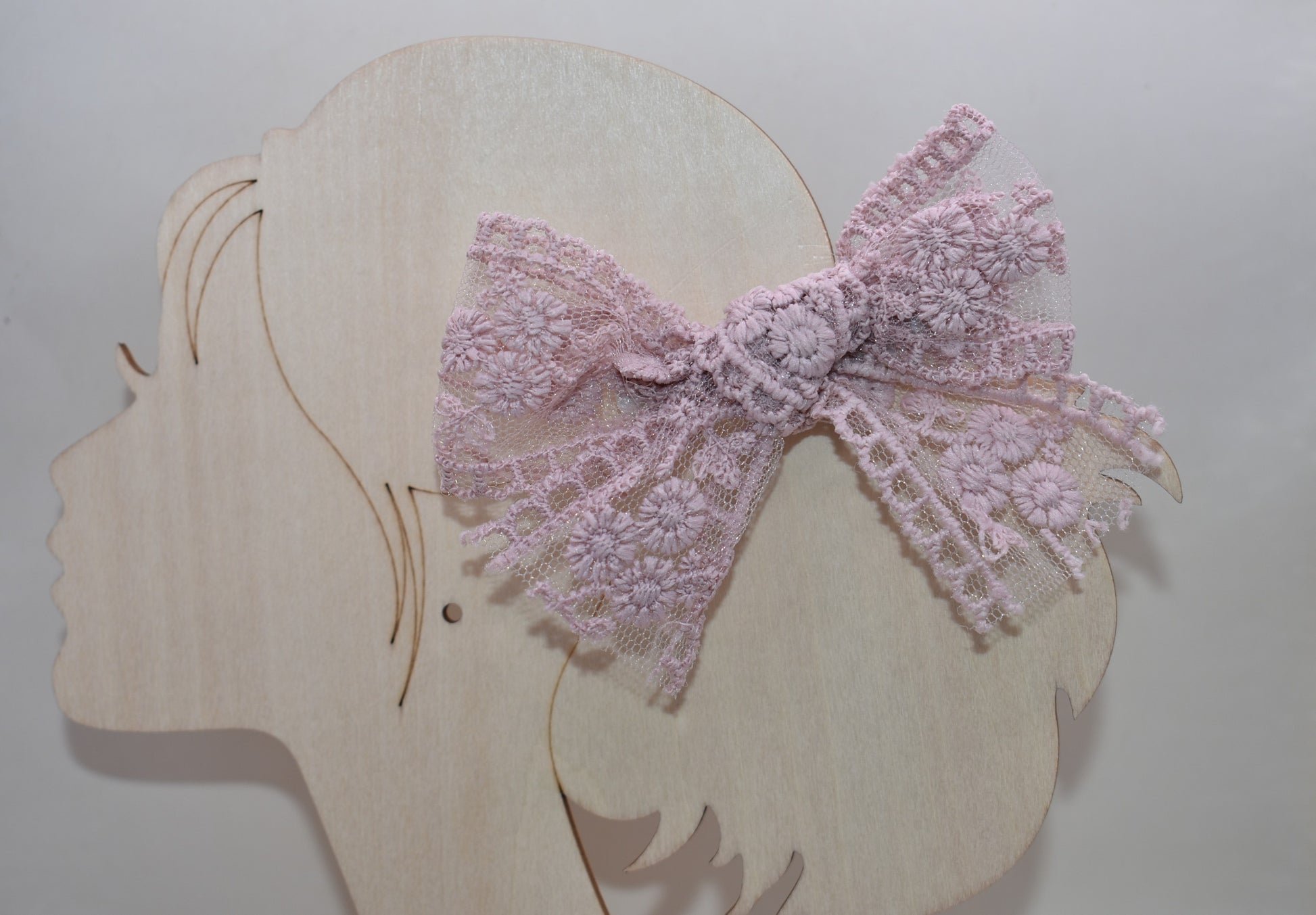 Adorable light mauve lace bows that bring a touch of elegance and whimsy to any look! This charming set of 2 features delicate lace detailing in a soft, romantic mauve shade—perfect for hair styling, gift wrapping, or adding a sweet accent to your favorite accessories. Whether you're dressing up for a special occasion or just want to add a little feminine flair to your everyday style, these bows are sure to make you smile. Versatile, lovely, and oh-so-pretty!