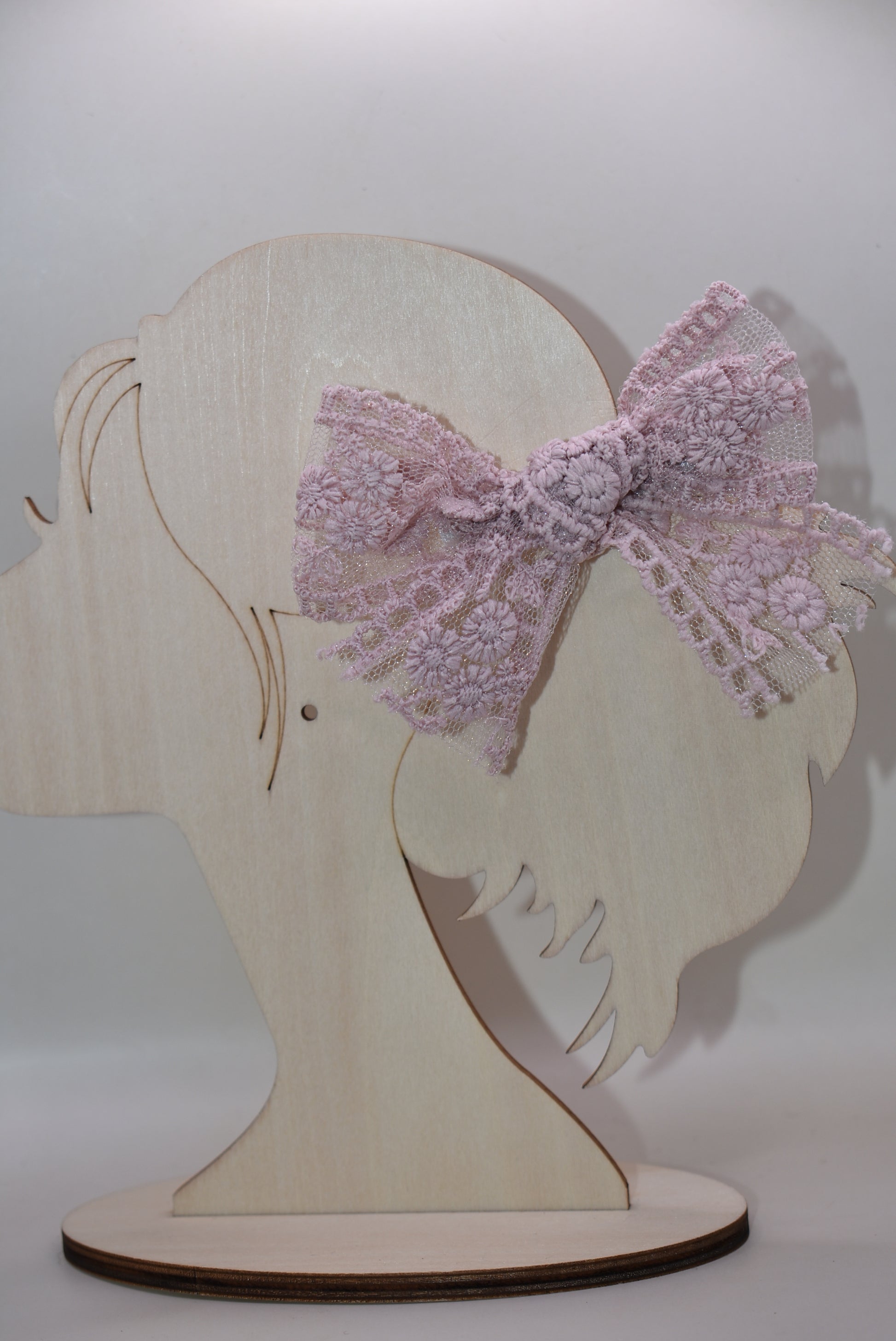 Adorable light mauve lace bows that bring a touch of elegance and whimsy to any look! This charming set of 2 features delicate lace detailing in a soft, romantic mauve shade—perfect for hair styling, gift wrapping, or adding a sweet accent to your favorite accessories. Whether you're dressing up for a special occasion or just want to add a little feminine flair to your everyday style, these bows are sure to make you smile. Versatile, lovely, and oh-so-pretty!