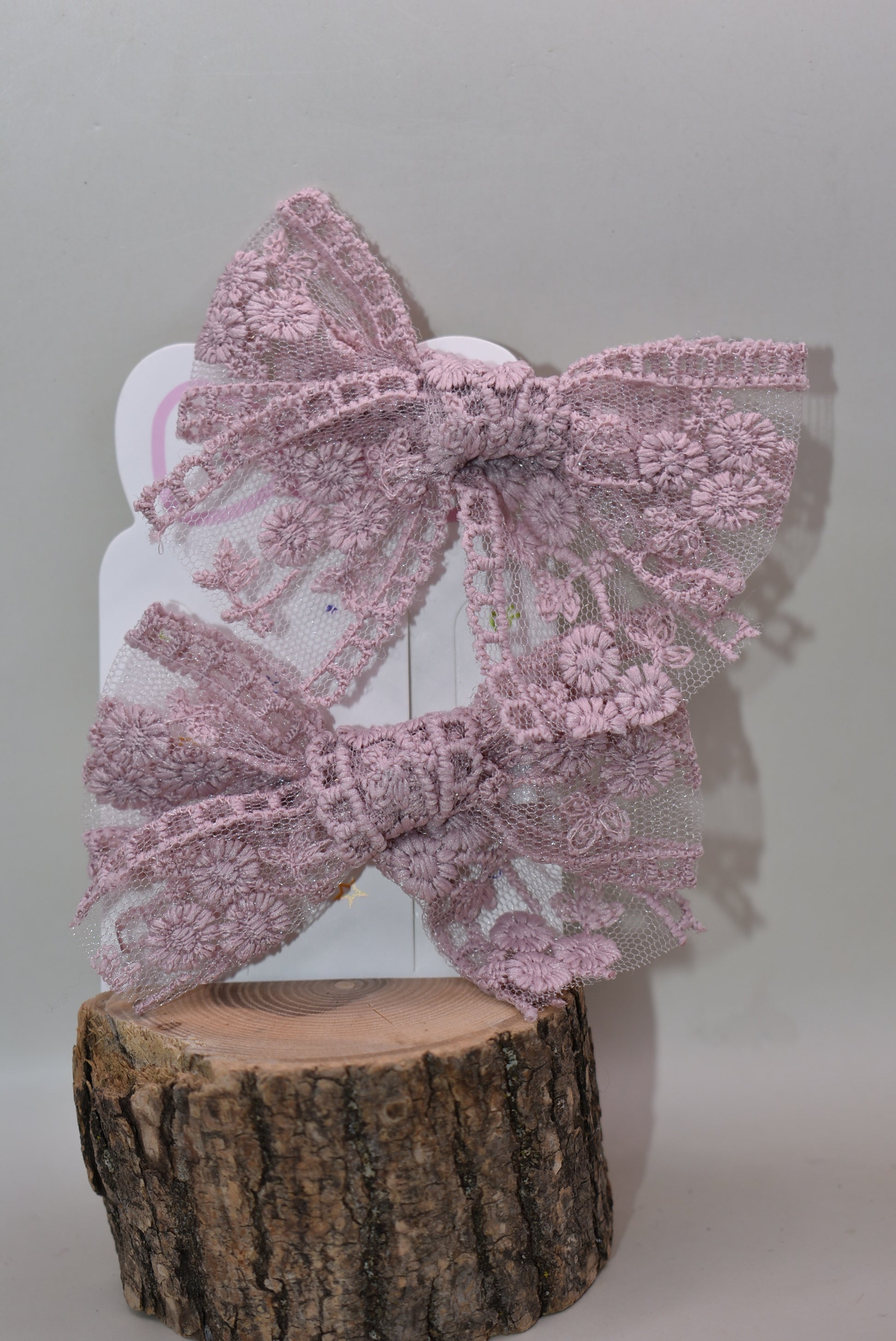 Adorable light mauve lace bows that bring a touch of elegance and whimsy to any look! This charming set of 2 features delicate lace detailing in a soft, romantic mauve shade—perfect for hair styling, gift wrapping, or adding a sweet accent to your favorite accessories. Whether you're dressing up for a special occasion or just want to add a little feminine flair to your everyday style, these bows are sure to make you smile. Versatile, lovely, and oh-so-pretty!
