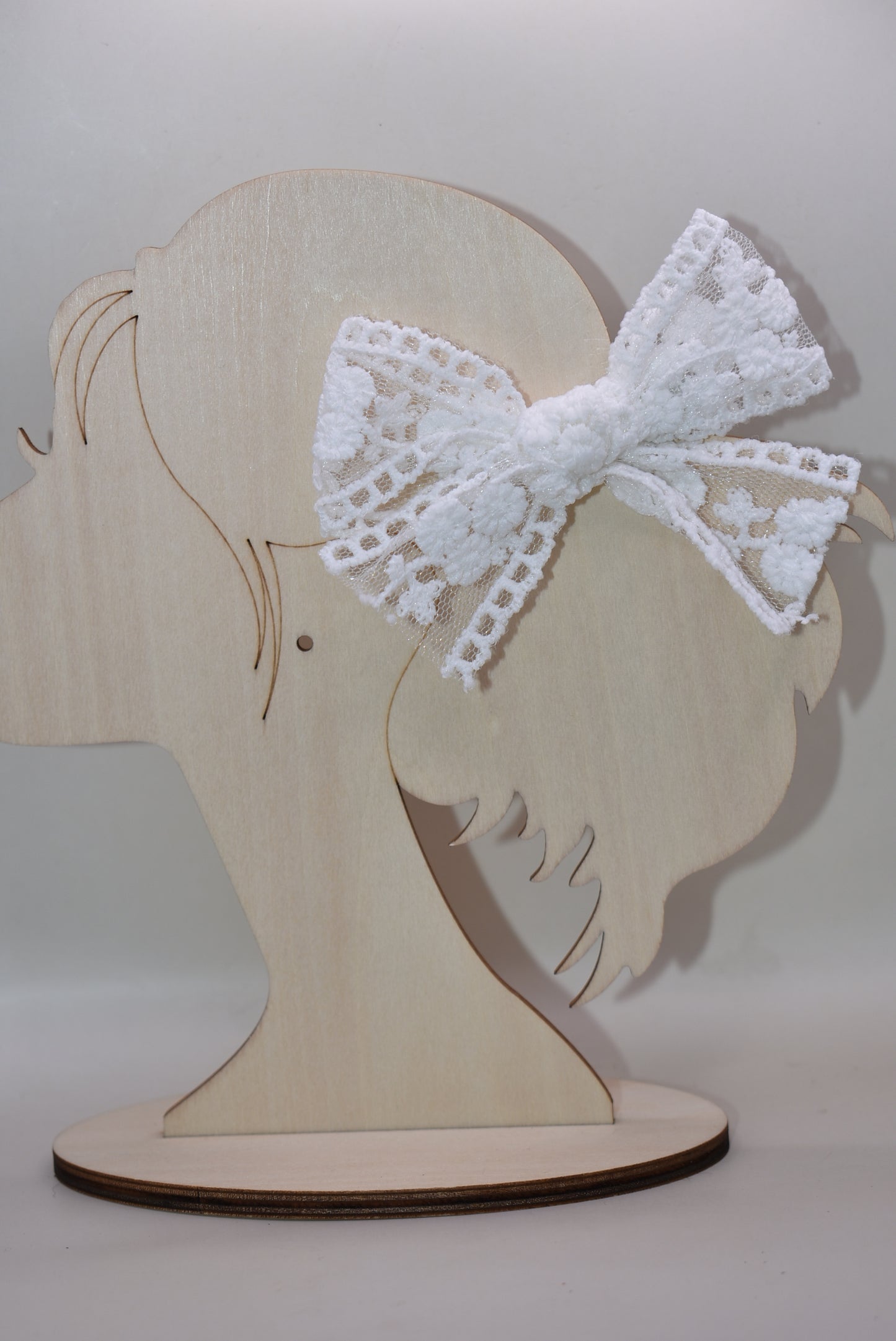 Elevate your style with these charming white lace bows—a delightful duo perfect for adding a touch of elegance to any look. Whether you're styling your hair, accessorizing a gift, or decorating a special occasion, these intricate lace beauties bring sophistication and whimsy in equal measure. Versatile, timeless, and oh-so-lovely, this set of 2 is your go-to for creating picture-perfect moments with effortless grace.
