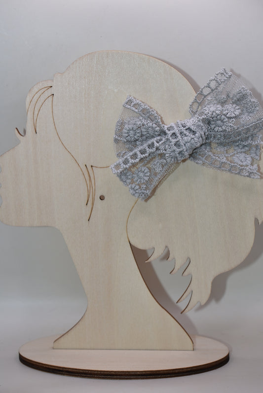 Elevate your style with this charming duo of grey lace bows! Perfect for adding a touch of elegance to any outfit, these delicate bows feature intricate lace detailing that brings sophistication and whimsy together. Whether you're dressing up for a special occasion or adding flair to everyday looks, these versatile accessories work beautifully in hair, on gifts, or as decorative accents. Soft, feminine, and endlessly cute—because sometimes two is better than one!