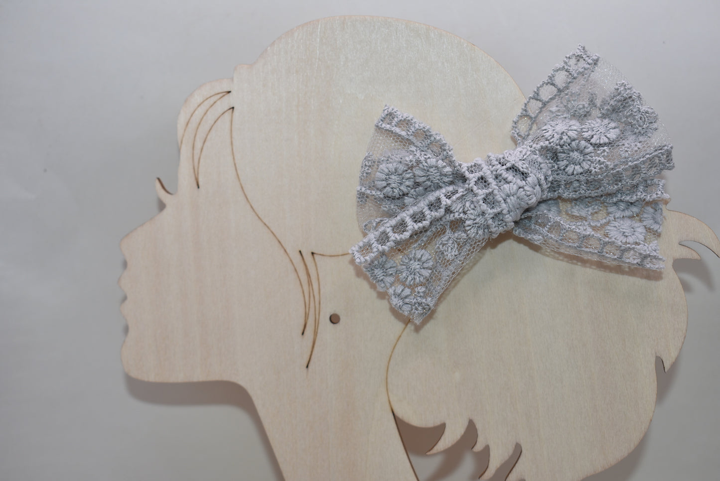 Elevate your style with this charming duo of grey lace bows! Perfect for adding a touch of elegance to any outfit, these delicate bows feature intricate lace detailing that brings sophistication and whimsy together. Whether you're dressing up for a special occasion or adding flair to everyday looks, these versatile accessories work beautifully in hair, on gifts, or as decorative accents. Soft, feminine, and endlessly cute—because sometimes two is better than one!