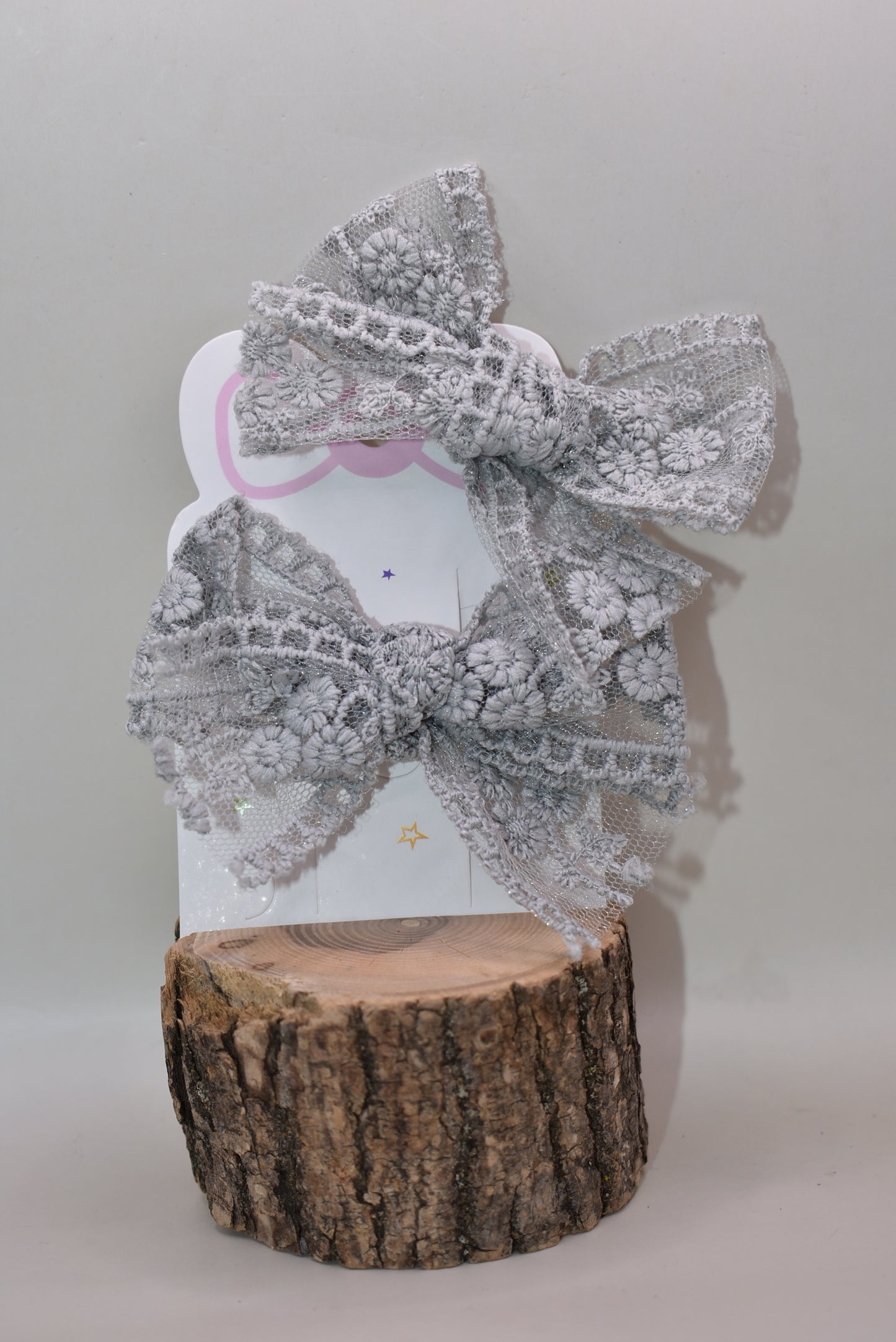 Elevate your style with this charming duo of grey lace bows! Perfect for adding a touch of elegance to any outfit, these delicate bows feature intricate lace detailing that brings sophistication and whimsy together. Whether you're dressing up for a special occasion or adding flair to everyday looks, these versatile accessories work beautifully in hair, on gifts, or as decorative accents. Soft, feminine, and endlessly cute—because sometimes two is better than one!