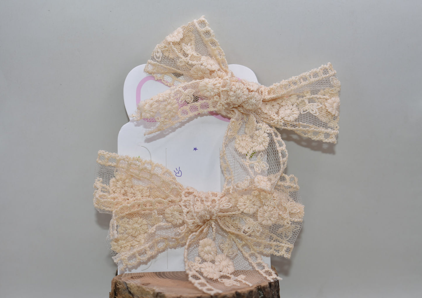 Elevate your style with these darling cream and off-white lace bows—a dynamic duo perfect for adding a touch of romantic flair to any look. Whether you're styling your hair, accessorizing a gift, or decorating a special occasion, these delicate bows bring instant charm and sophistication. The timeless lace detailing pairs beautifully with any outfit, making them go-to pieces for both everyday wear and memorable moments. With two bows in your collection, you'll always have the perfect finishing touch within 