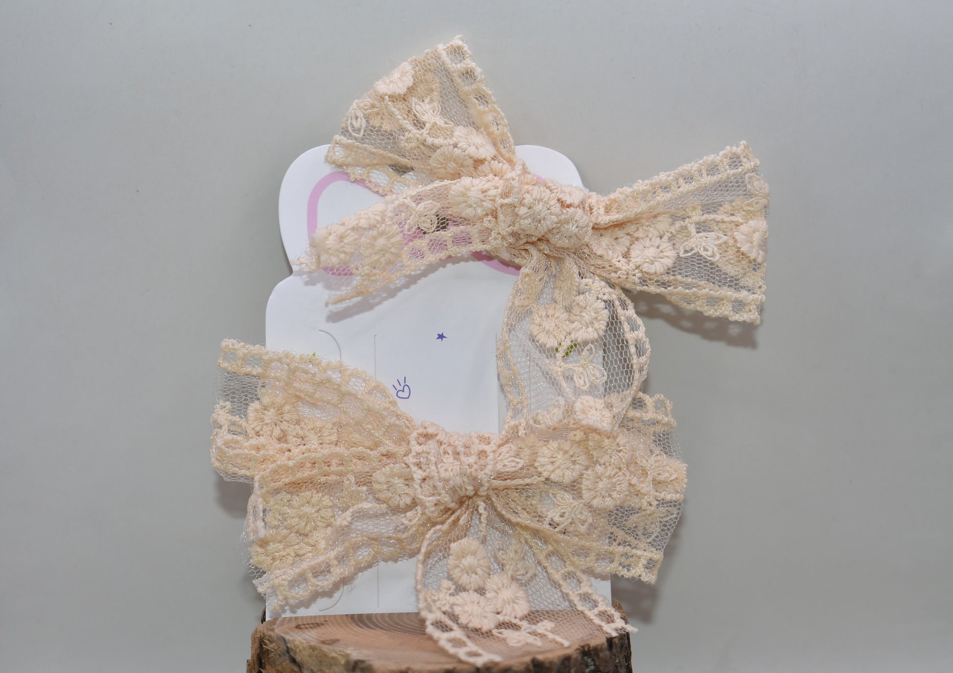 Elevate your style with these darling cream and off-white lace bows—a dynamic duo perfect for adding a touch of romantic flair to any look. Whether you're styling your hair, accessorizing a gift, or decorating a special occasion, these delicate bows bring instant charm and sophistication. The timeless lace detailing pairs beautifully with any outfit, making them go-to pieces for both everyday wear and memorable moments. With two bows in your collection, you'll always have the perfect finishing touch within 
