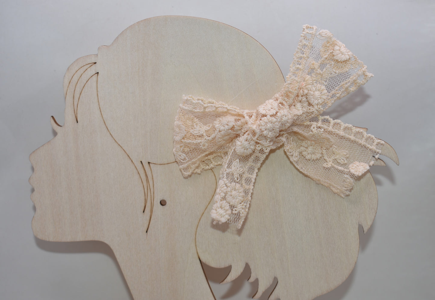 Elevate your style with these darling cream and off-white lace bows—a dynamic duo perfect for adding a touch of romantic flair to any look. Whether you're styling your hair, accessorizing a gift, or decorating a special occasion, these delicate bows bring instant charm and sophistication. The timeless lace detailing pairs beautifully with any outfit, making them go-to pieces for both everyday wear and memorable moments. With two bows in your collection, you'll always have the perfect finishing touch within 