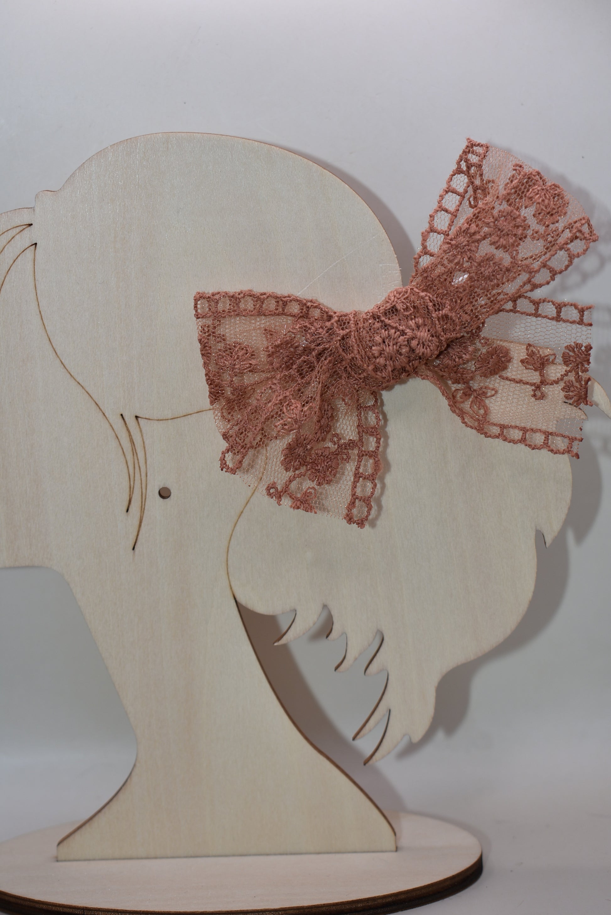 Elevate your style with this charming duo of rust-colored lace bows! Perfect for adding a touch of vintage-inspired elegance to any outfit, these delicate bows feature intricate lace detailing that catches the eye. Whether you're styling your hair, accessorizing a gift, or decorating a special project, this set of two offers versatile charm. The warm rust hue pairs beautifully with both neutral and bold palettes, making these bows a go-to accessory for any occasion. Sweet, sophisticated, and endlessly fun!