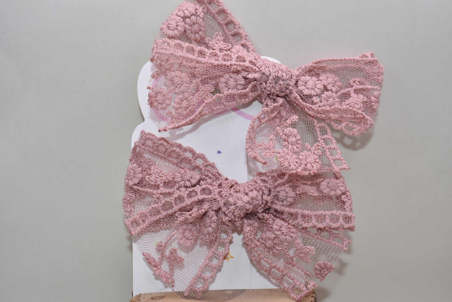 Elevate your style with this charming duo of dark mauve lace bows! Perfect for adding a touch of elegance to any look, these delicate bows feature intricate lace detailing that brings sophistication and whimsy together. Whether you're styling your hair, accessorizing a gift, or decorating a special occasion, these versatile beauties work magic. The rich mauve hue pairs beautifully with any color palette, making them a go-to accessory for fashion lovers who appreciate the finer details. Get both bows and dou