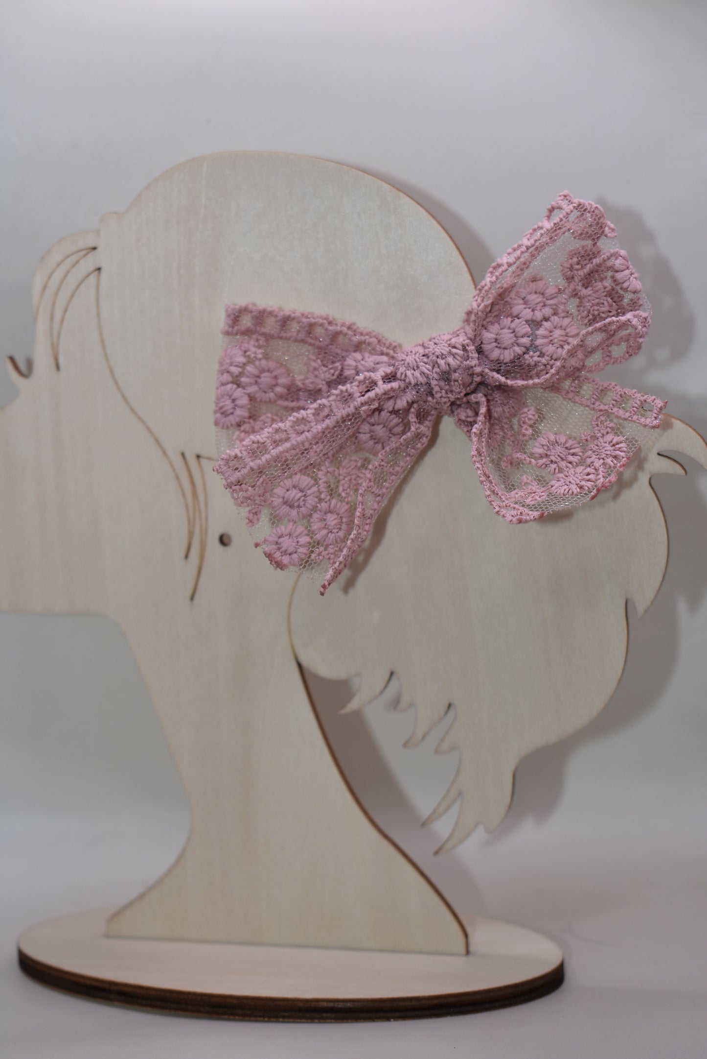 Elevate your style with this charming duo of dark mauve lace bows! Perfect for adding a touch of elegance to any look, these delicate bows feature intricate lace detailing that brings sophistication and whimsy together. Whether you're styling your hair, accessorizing a gift, or decorating a special occasion, these versatile beauties work magic. The rich mauve hue pairs beautifully with any color palette, making them a go-to accessory for fashion lovers who appreciate the finer details. Get both bows and dou