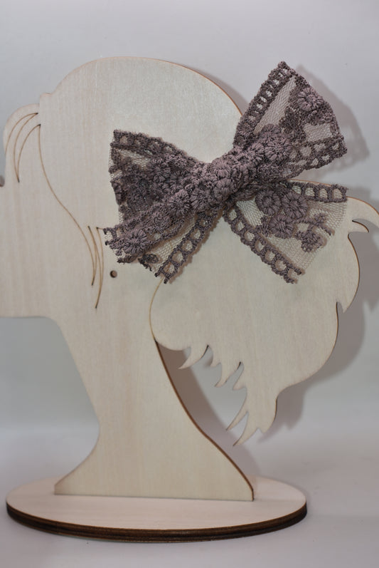 Elevate your accessory game with this charming duo of dark brown lace bows! Perfect for adding a touch of elegance to any hairstyle, outfit, or craft project, these chocolate-toned beauties feature delicate lace detailing that brings sophistication and whimsy. Whether you're dressing up for a special occasion or just want to add a little flair to your everyday look, these versatile bows are your new go-to accessory. Get both and double your style options!