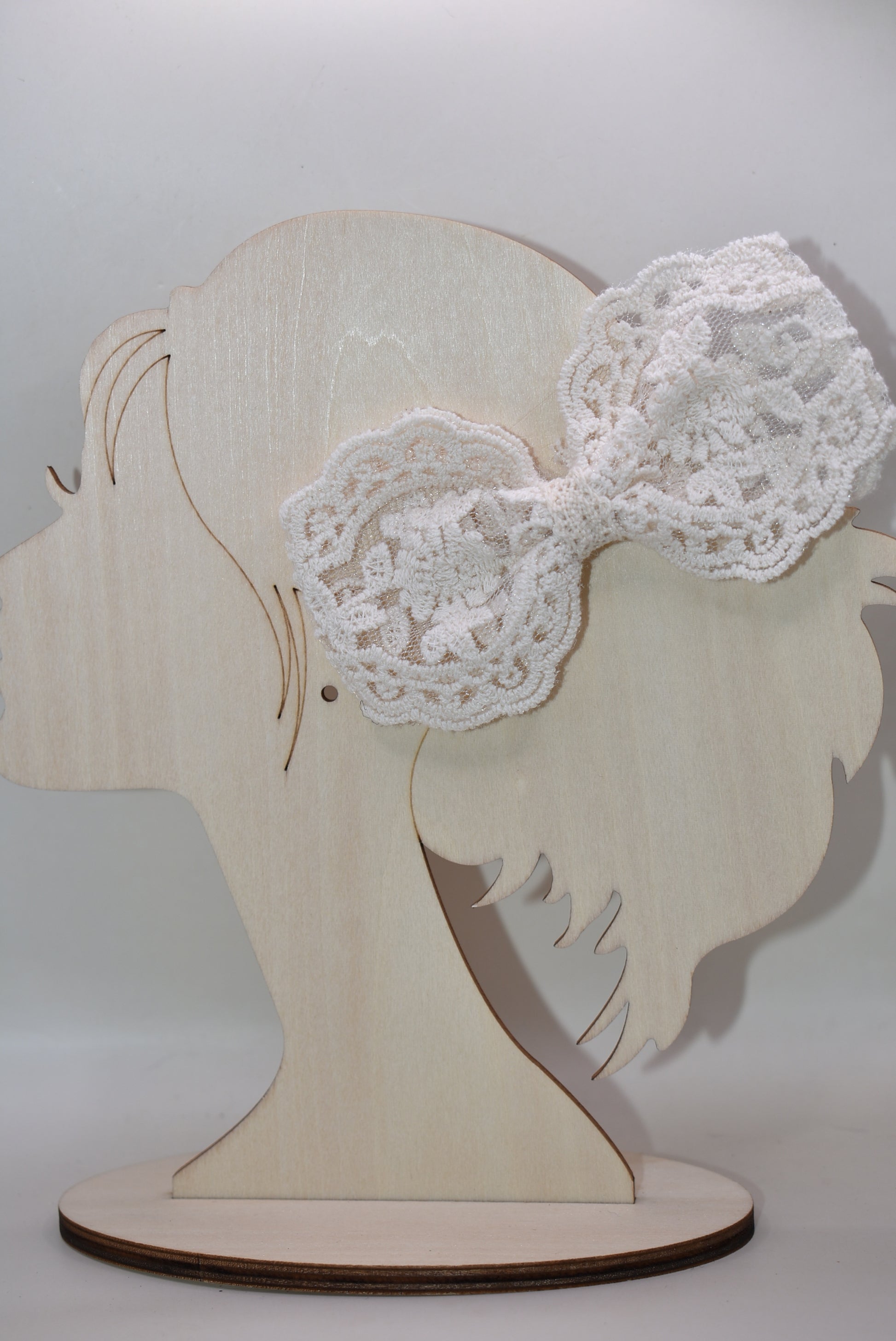 Get twice the charm with this adorable set of two cream/off-white lace bows! These delicate, feminine accessories are perfect for adding a sprinkle of elegance to your hair, gifts, or craft projects. With their intricate lace details and soft, neutral tones, they're the ultimate versatile pair for any occasion—from casual days to special celebrations. Mix, match, and style away with double the fun!
