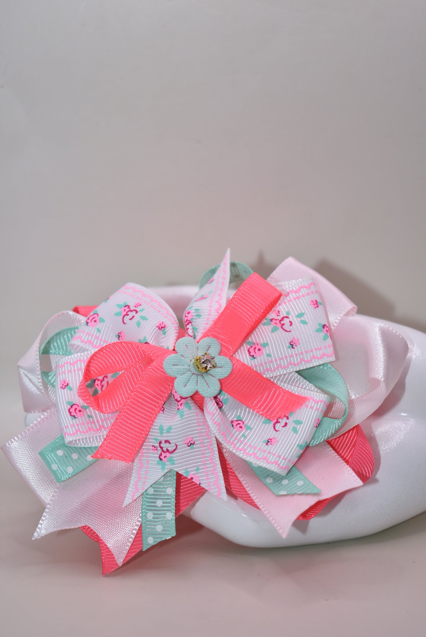 Spring into style with this adorable layered bow clip! 🌸 Featuring a cheerful mix of polka dots and delicate flowers, it's the perfect pop of color for any warm-weather look. ✨ The wrapped alligator clip makes styling effortless—just clip and go! 🎀 Whether you're dressing up a ponytail or adding flair to your favorite hairstyle, this sweet accessory brings instant fun and personality to your Spring and Summer wardrobe. 🌼💕