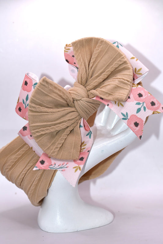 Wrap your little one's hair in style with our Wrapped Headband Collection 20! 🎀 Crafted from ultra-soft, stretchy material that fits any head size comfortably, these headbands are perfect for keeping hair in place throughout the day. Each design features a charming floral ribbon detail that adds a touch of sweetness to any outfit. 🌸 Whether you're dressing up for a special occasion or keeping things casual, these versatile headbands complement every look. ✨ Gentle on delicate hair and easy to wear, they'r