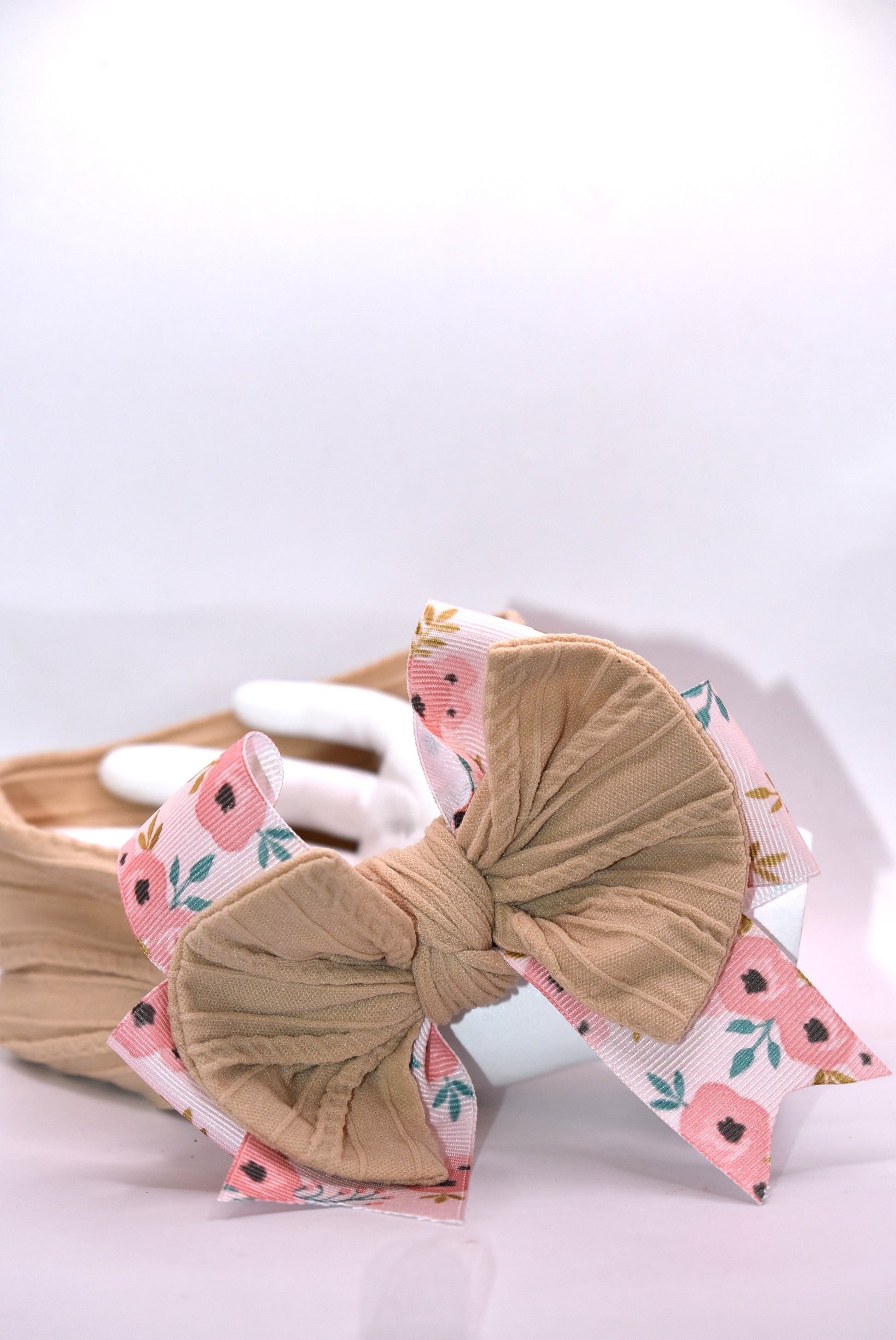 Wrap your little one's hair in style with our Wrapped Headband Collection 20! 🎀 Crafted from ultra-soft, stretchy material that fits any head size comfortably, these headbands are perfect for keeping hair in place throughout the day. Each design features a charming floral ribbon detail that adds a touch of sweetness to any outfit. 🌸 Whether you're dressing up for a special occasion or keeping things casual, these versatile headbands complement every look. ✨ Gentle on delicate hair and easy to wear, they'r