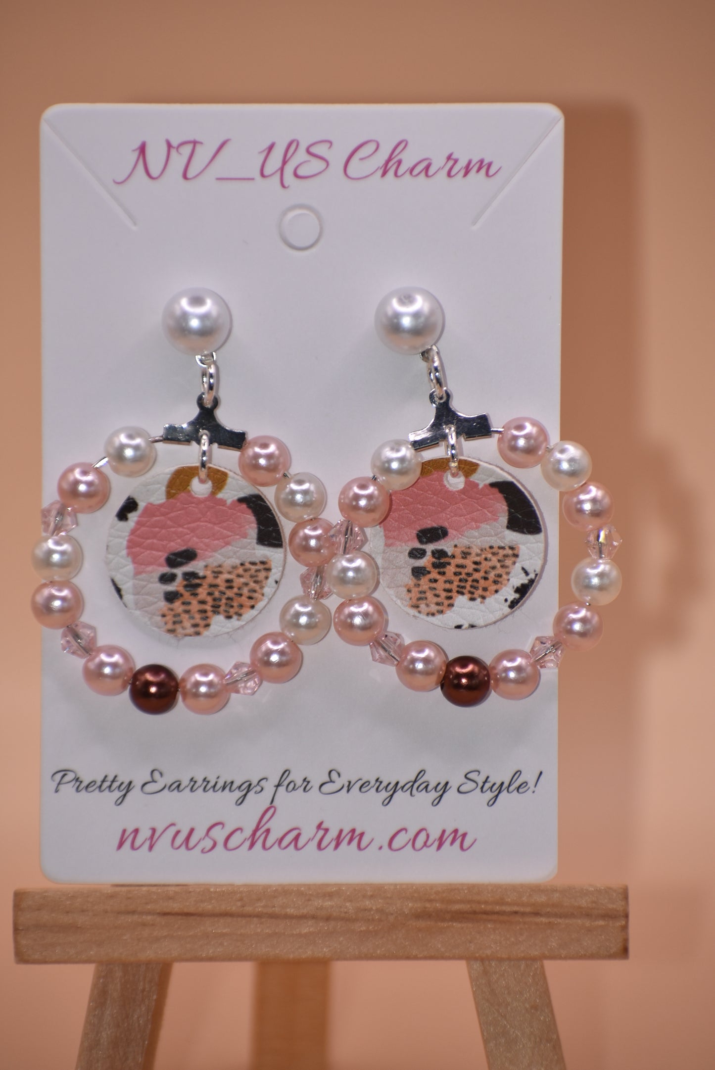 Retire those standard earrings and add the WILD side with our Wild Side Collection. Jam-packed with pearls and crystals, these fun earrings will have you 'roaring' with confidence - not to mention looking stylish and unique! Silver-plated post and faux leather flower/leopard print center make it a must-have.