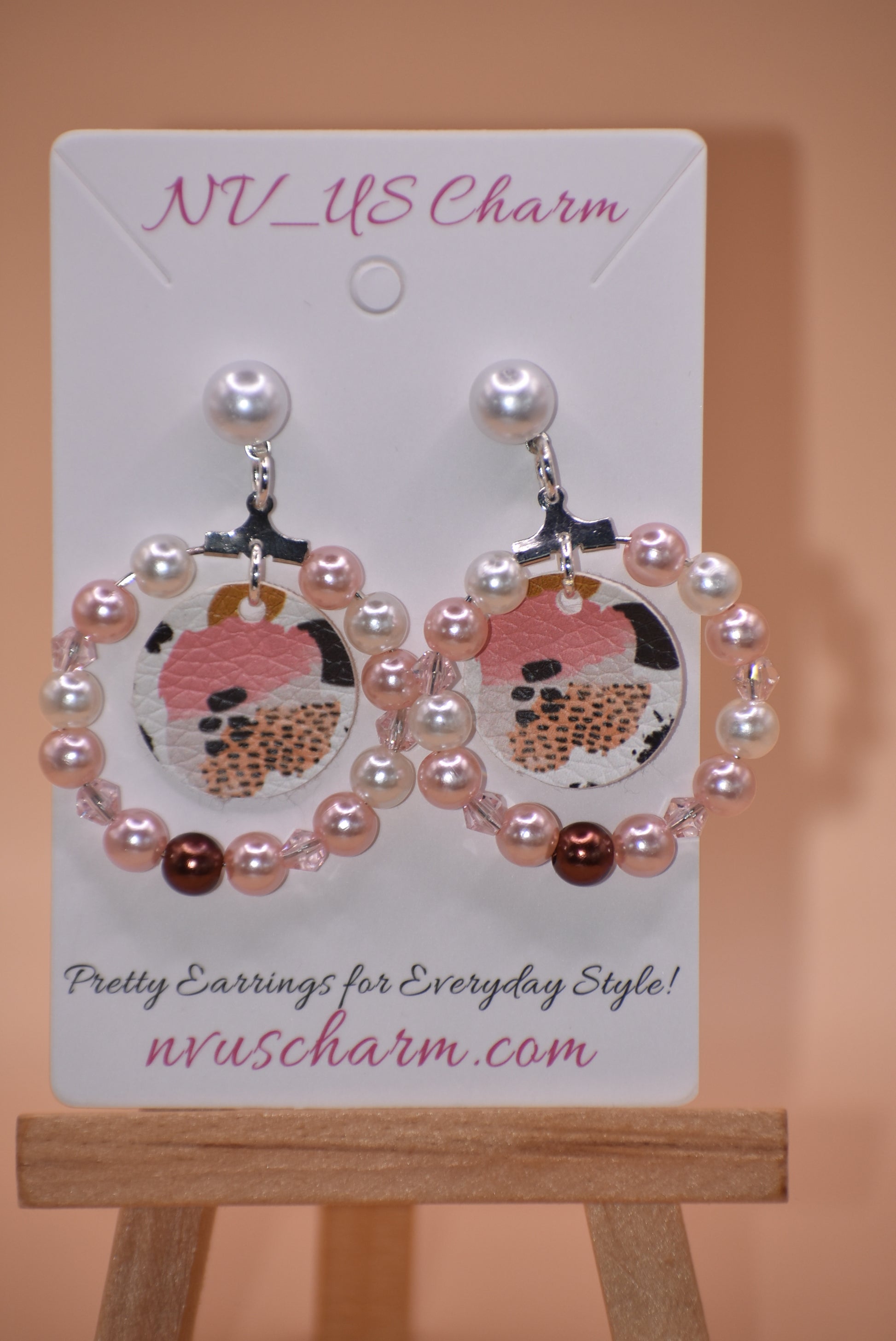 Retire those standard earrings and add the WILD side with our Wild Side Collection. Jam-packed with pearls and crystals, these fun earrings will have you 'roaring' with confidence - not to mention looking stylish and unique! Silver-plated post and faux leather flower/leopard print center make it a must-have.