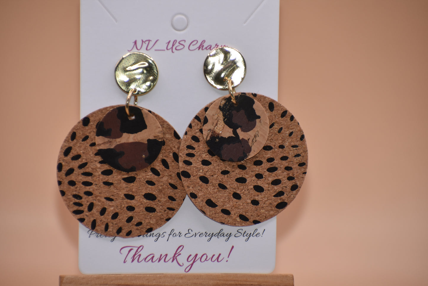 Walk on the wild side with these unique round cork leopard print earrings! Comfortably lightweight and crafted with a gold plated, hypoallergenic post, these are sure to make a statement without weighing you down! Ready for a roarin' good time? Jazz up any look with these wild accessories!