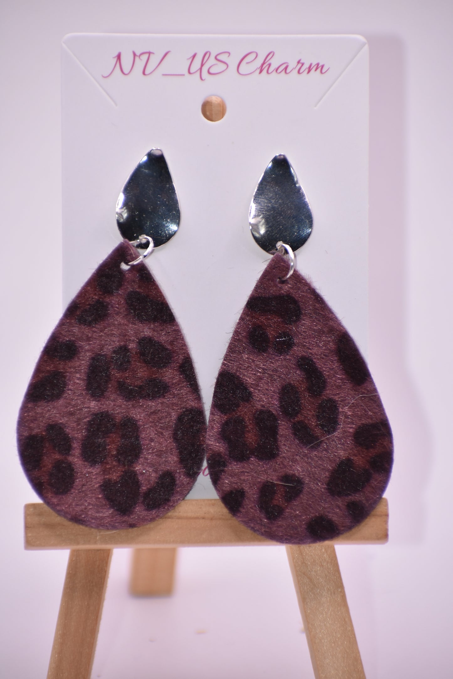 Unleash your wild side with our Safari Collection! 🐾 Featuring playful purple leopard print teardrop earrings 🎀 with pear-shaped silver filled posts for extra comfort. Lightweight design makes them easy to wear all day long! 🙌