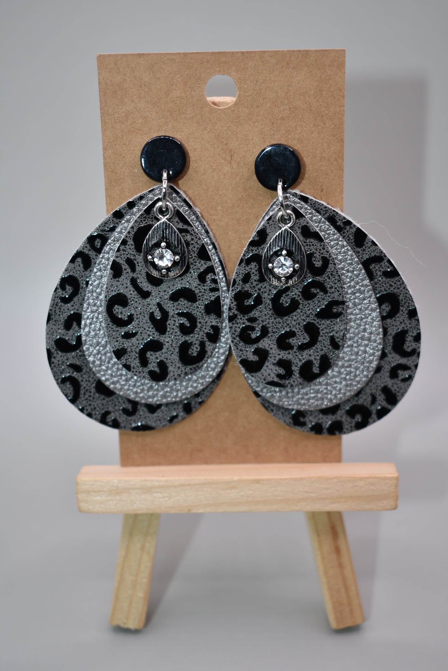 Black posts hold these gray/black leopard earrings with a pretty crystal charm. Super comfortable and perfect for that black sweater or shirt.  Definitely an attention getter.  